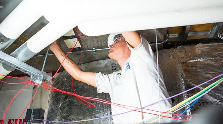 Content_CAP-ElectricianInCeilingWithWires-1