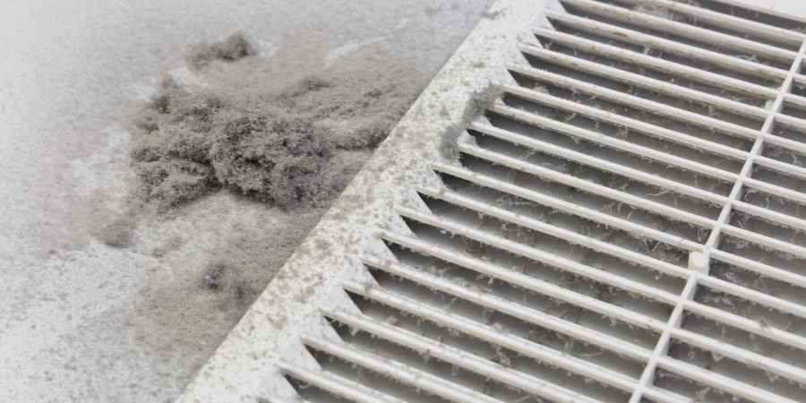 Air vent covered in dust